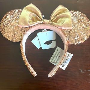 Minnie Mouse Ears. Rose Good with sequins and metallic bow.